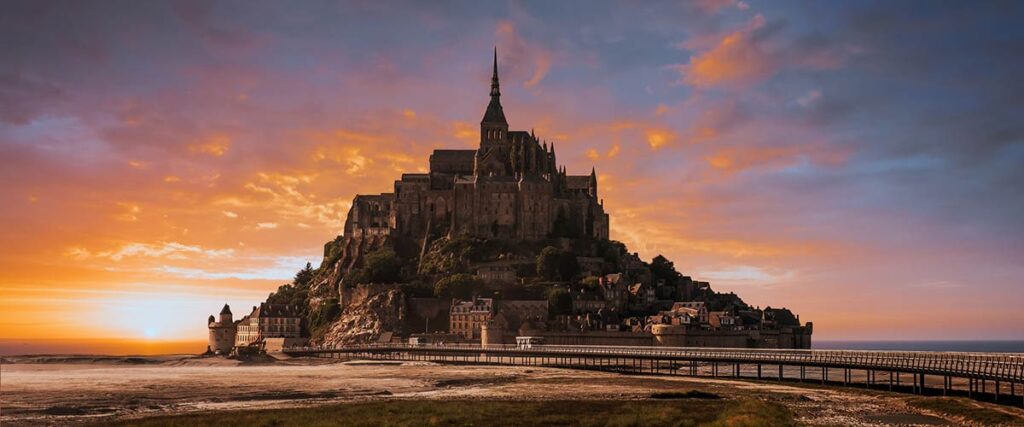 Mont Saint Michel tidal island sunset, Normandy, France